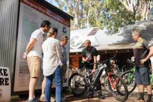 The Hairy Marron in Margaret River. Man providing instructions to a group of people on local bike riding trails around Margaret River.